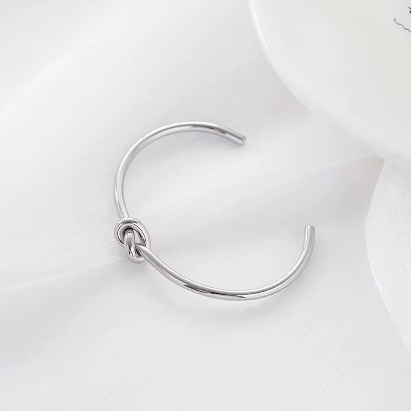 The Thin Knot Silver Bangle